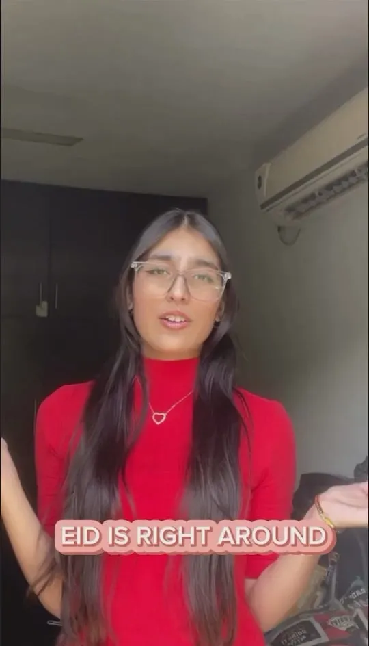 A creator in a red top, captioned “Eid is right around”